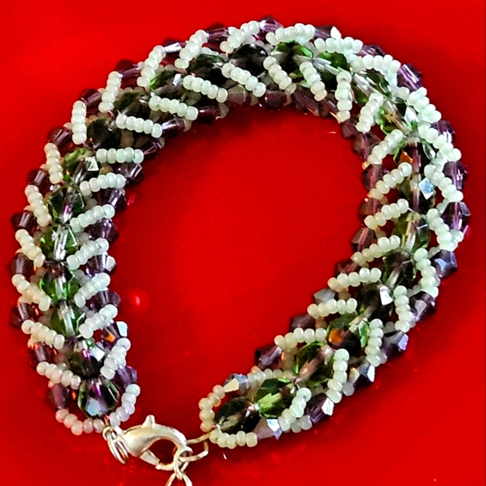 Handmade Elegant Flat Spiral Stitch Hand Bead Bracelet.  Purple Swarvoski Beads.